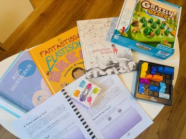 Boeken, een denkspel en een werkboekje over groeimindset in de praktijk